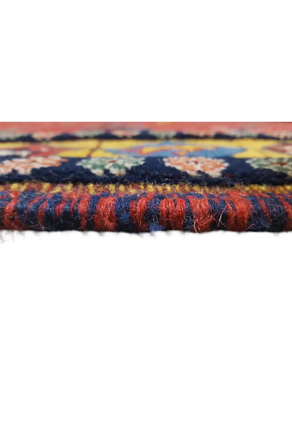 Soumak rug: detail of the pile and fringe, dark blue finish on the red edge