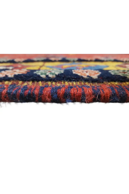 Soumak rug: detail of the pile and fringe, dark blue finish on the red edge