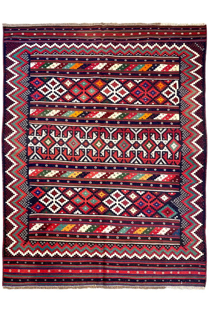Complete kilim rug: central ornaments, zigzag border, and stripes in red, blue, and green.