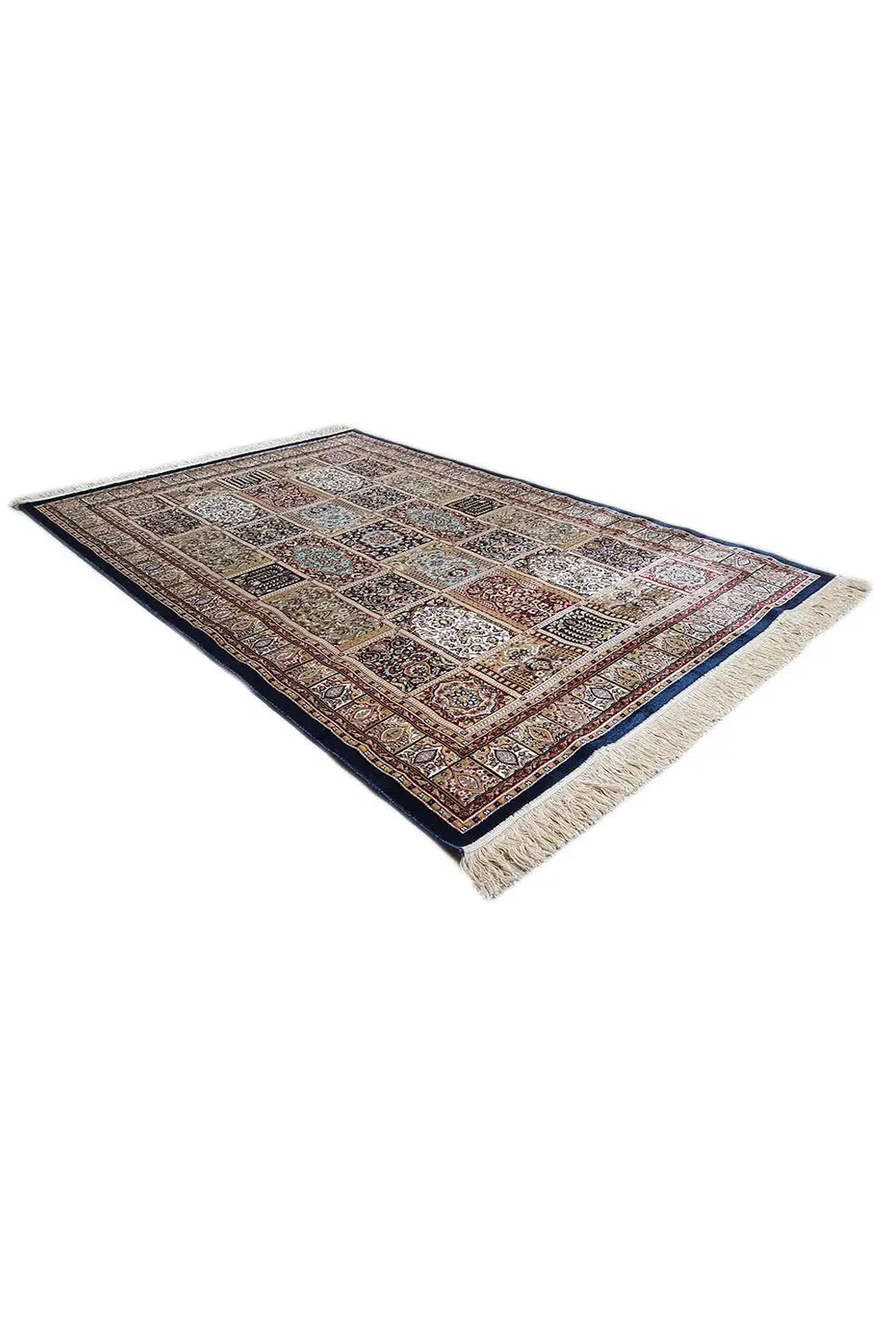 Machine-woven rug, spread out with a beige fringed edge and geometric ornamental pattern
