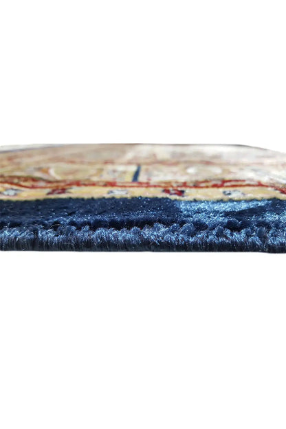 Machine-woven carpet edge view: pile and seam, multicolored border with dark pile