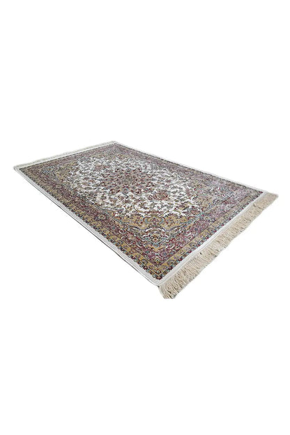 Machine-woven rug 225x150 cm, corner view with floral ornamentation and fringes