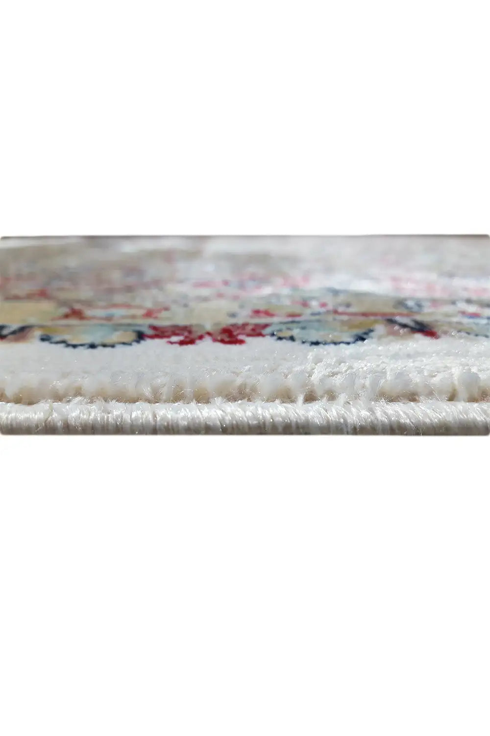 Rug edge with fringe and multicolored border, close-up of the weave structure
