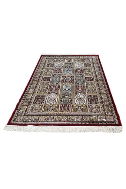 Machine-woven rug with an ornamental pattern, multicolored, rectangular, with fringes along the edge