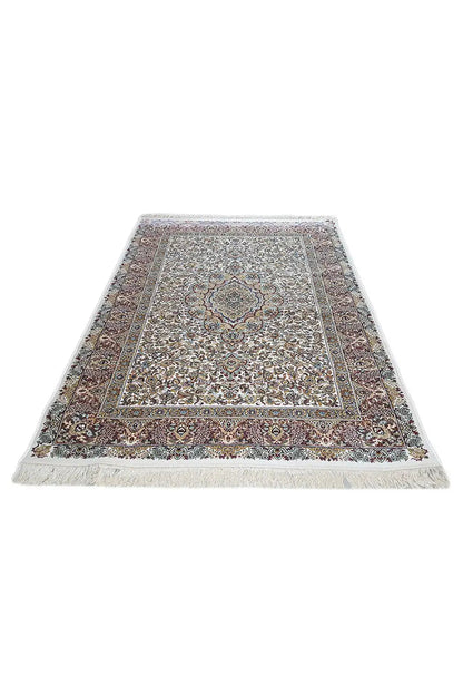 Machine-woven rug, flat design with a border pattern and colorful ornaments, fringes