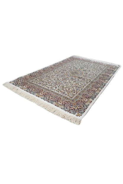 Machine-woven beige rug with a multicolored square/frame pattern and fringes