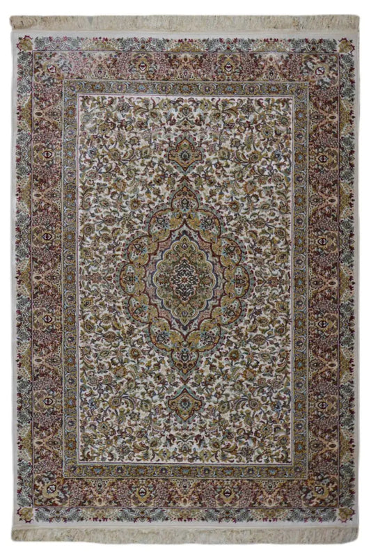 Machine-woven rug with an ornamental medallion pattern, surrounding border, and fringes