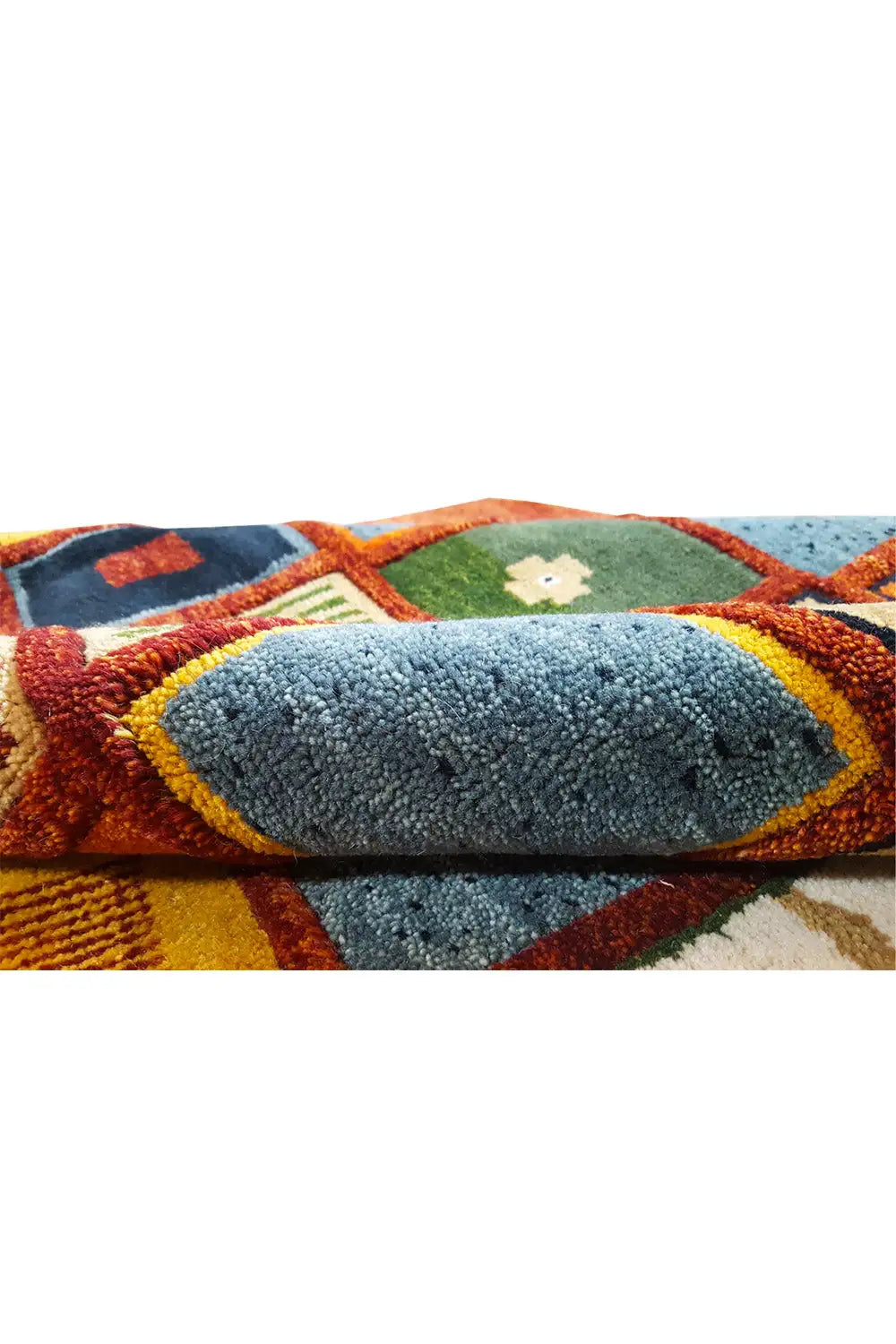 “Lori” Gabbeh rug with multicolored tile patterns in turquoise, green, orange, and a blue border