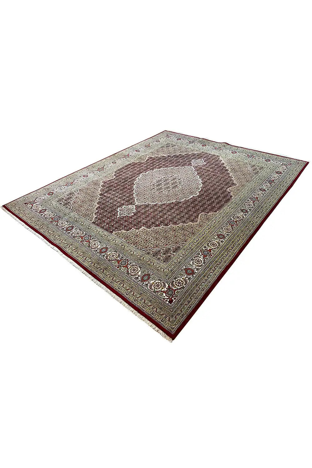 Indo Tabriz rug, diagonal view with central medallion in brown and beige