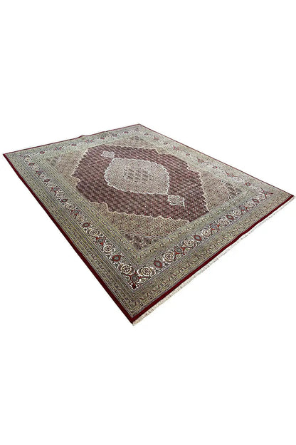 Indo Tabriz rug, angled, with a medallion and ornamental border