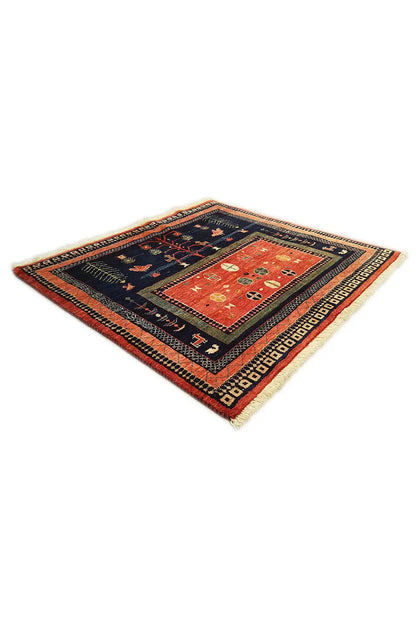 Qashqai exclusive rug 86x95 cm, dark blue with a red central section and decorative border