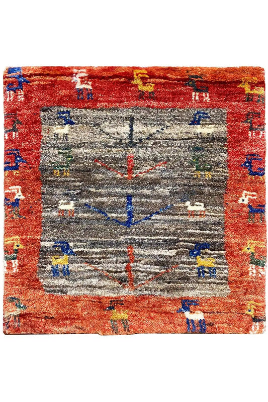 Square Gabbeh rug, gray center and reddish-brown border with colorful motifs