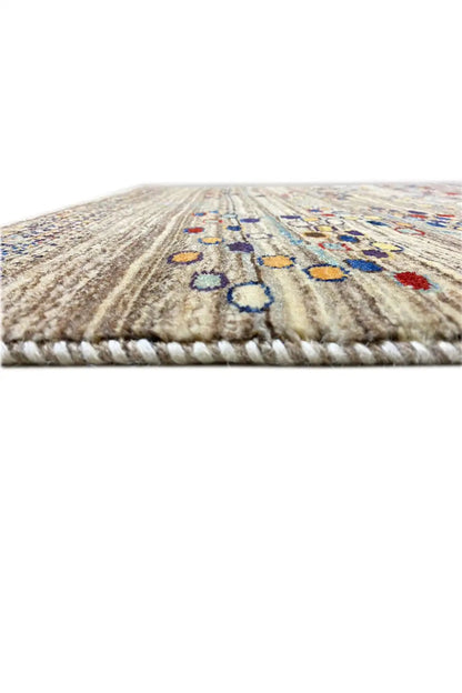 Gabbeh rug 142x82 cm, edge view with colorful motifs and a bound edge
