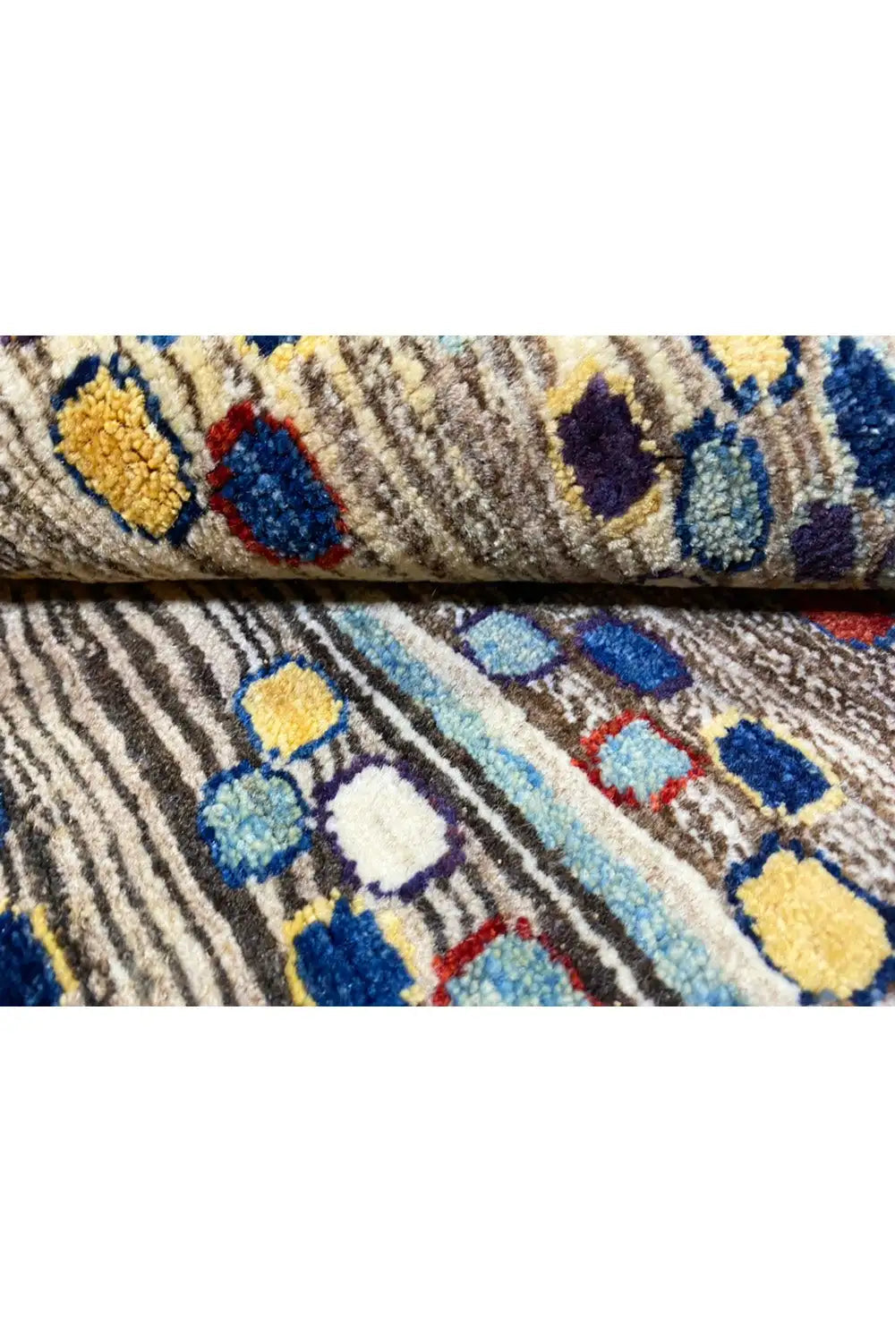 Gabbeh rug 142x82 cm, detail of the colored dots in blue, yellow, and red on a light background