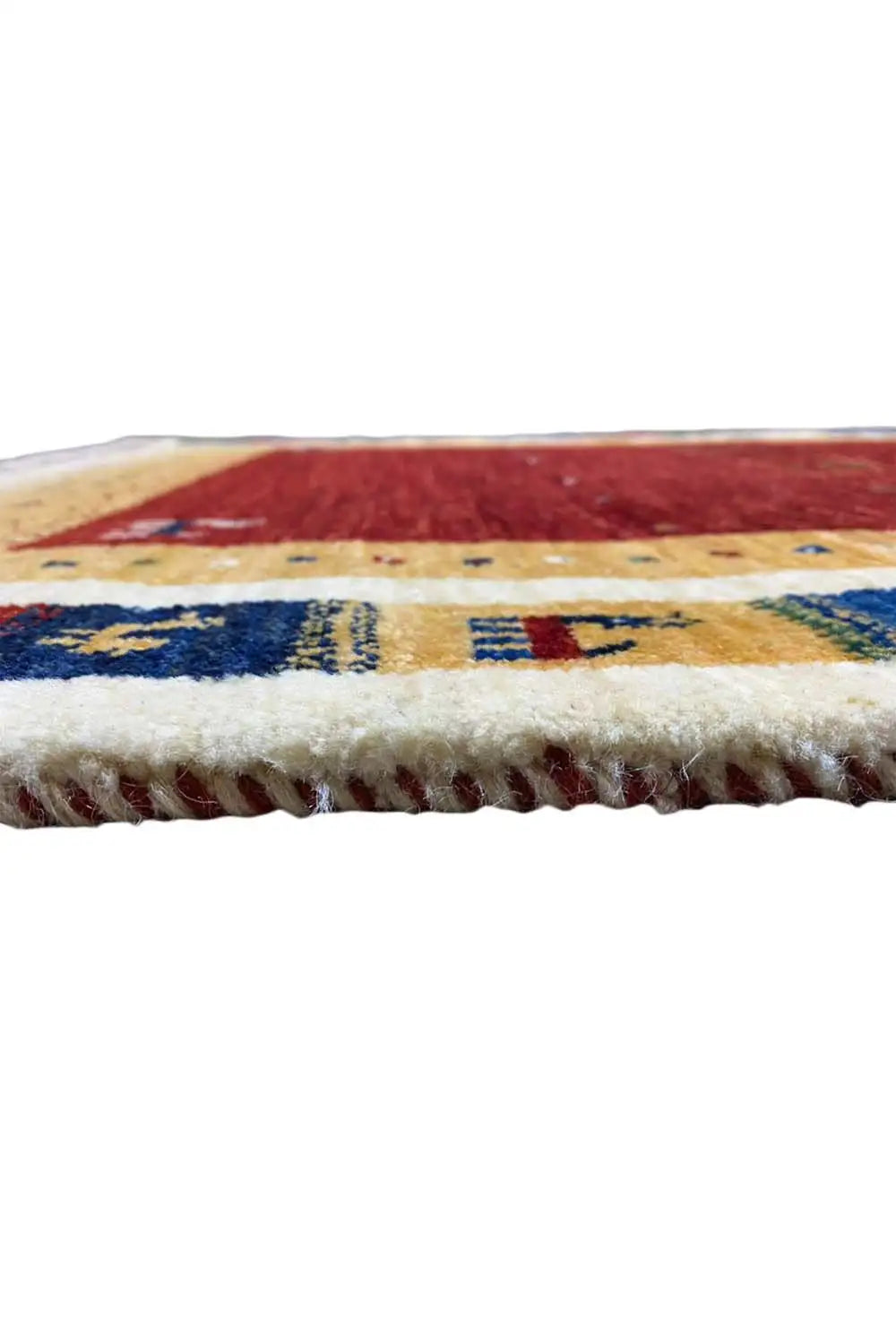 Gabbeh rug (123x80 cm) edge detail with fringe, red-beige area and border pattern
