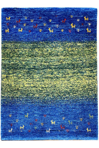 Gabbeh rug Lori (85x61 cm): blue-green rectangular rug with colorful animal motifs