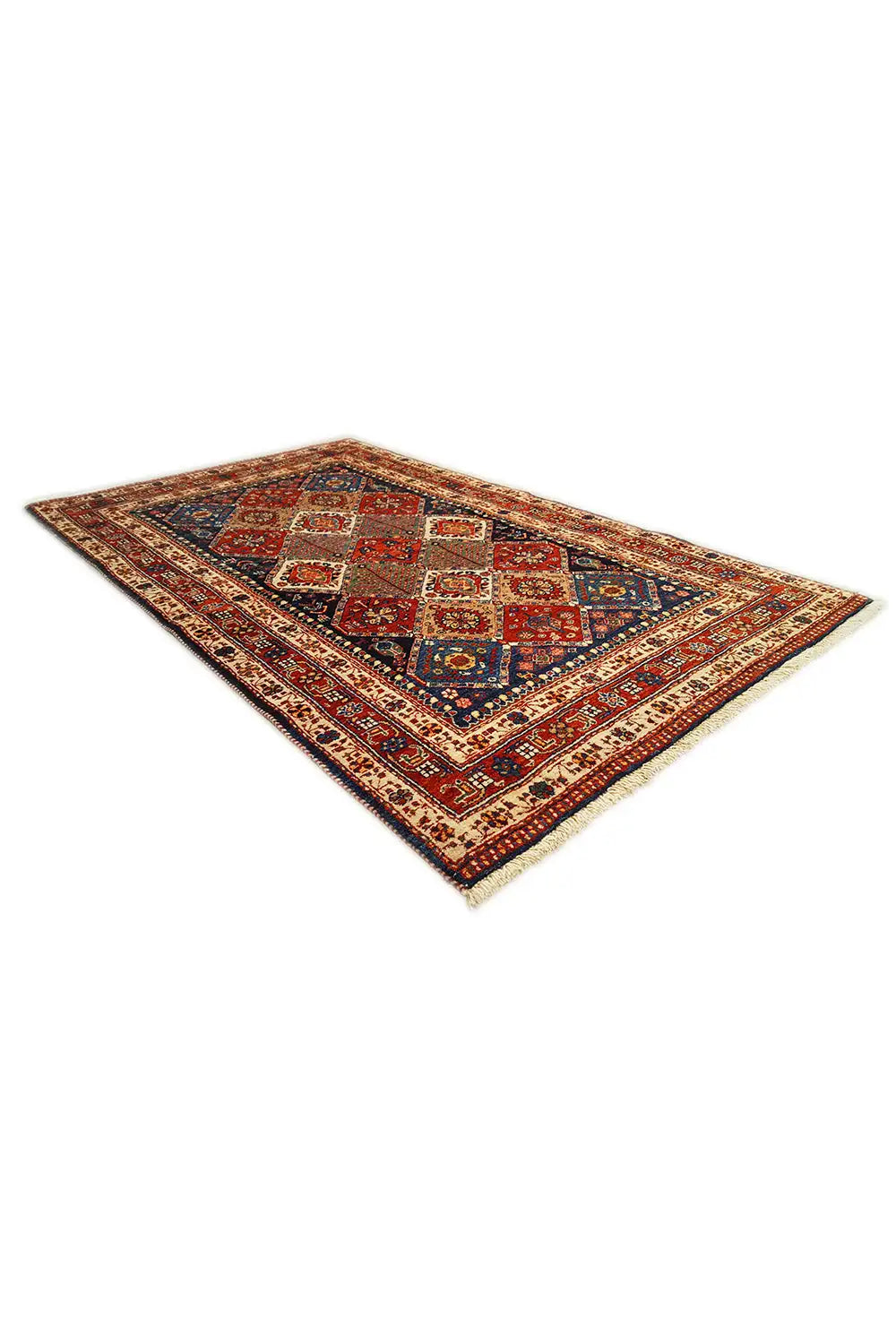 Rectangular oriental rug with a blue-and-red diamond pattern and decorative border