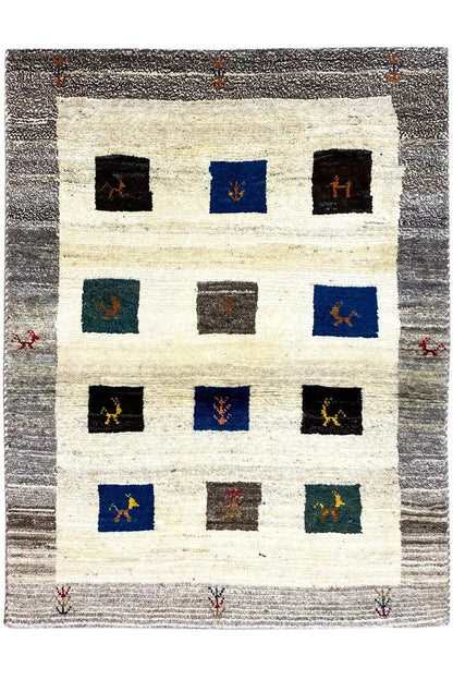 Gabbeh rug (117x85 cm) with a square grid pattern in black, blue, green and cream