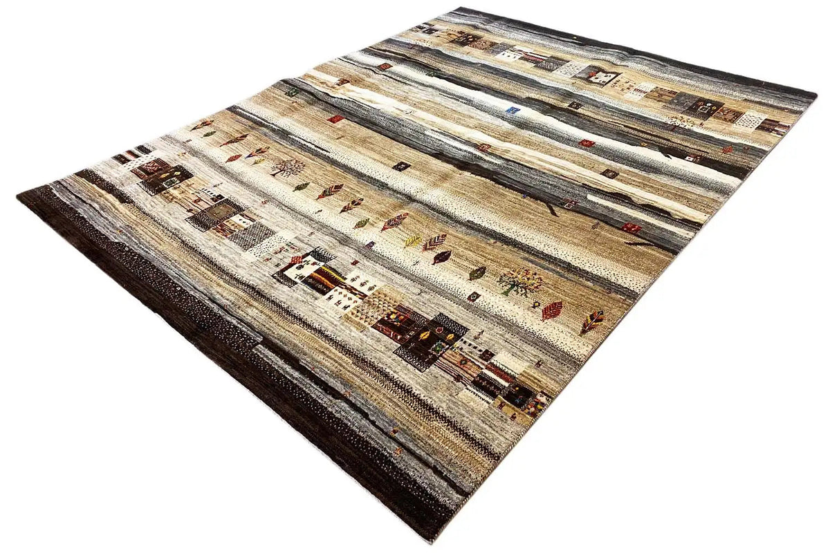 Beige/brown rug with horizontal stripes and patterned squares, photographed at an angle