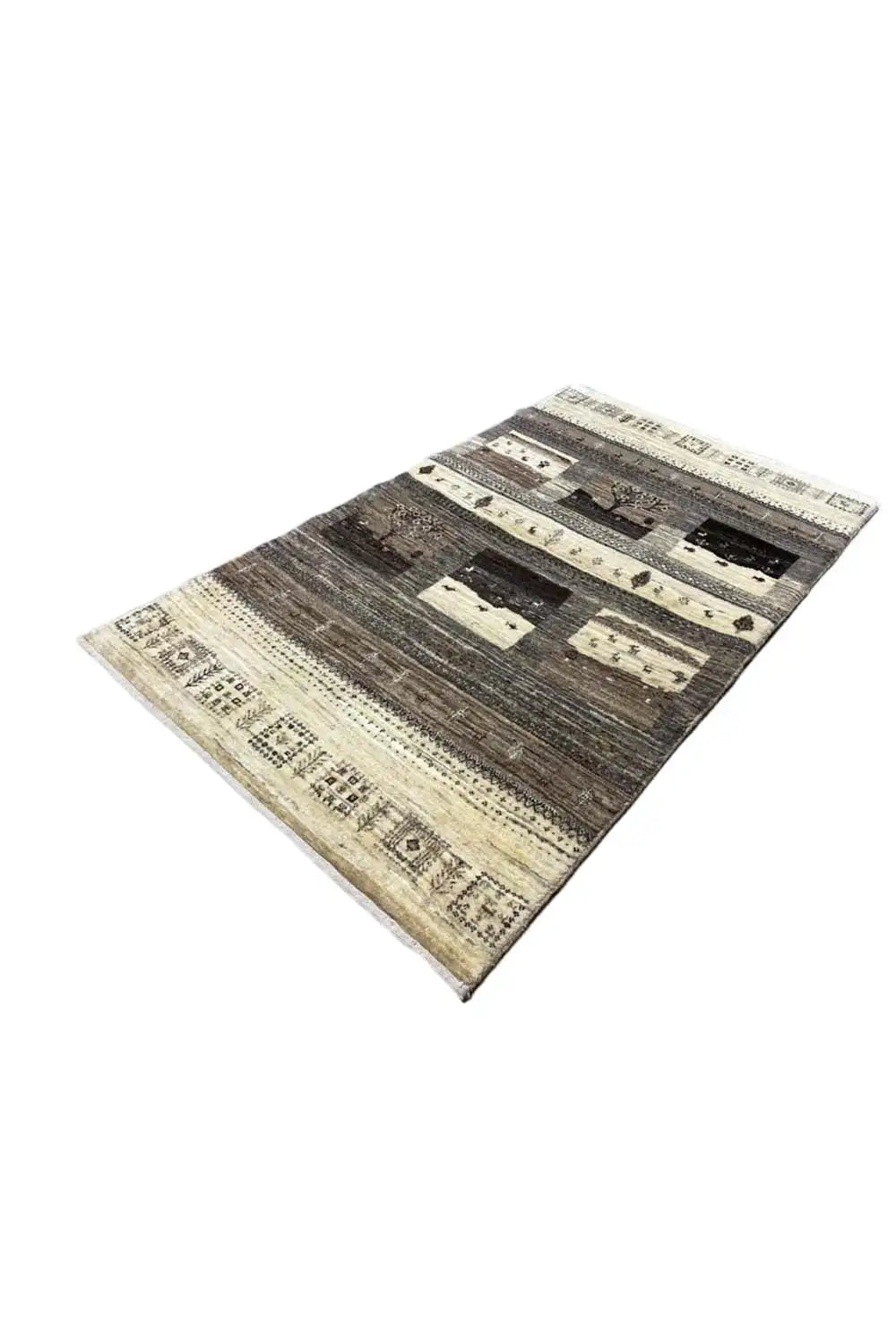 Rug in an angled view with contrasting panels and stripes in beige and brown