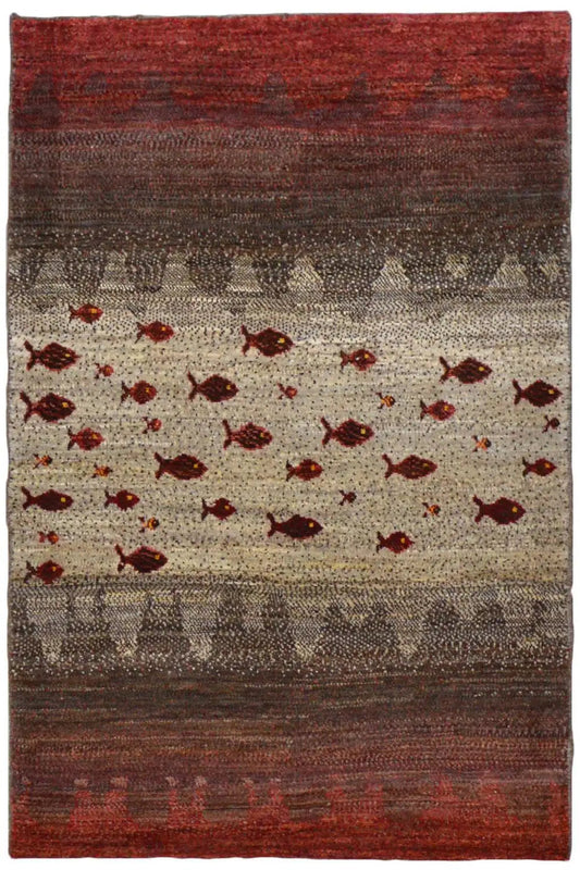 Gabbeh rug, red and beige with red fish-motif designs and a wide border, rectangular