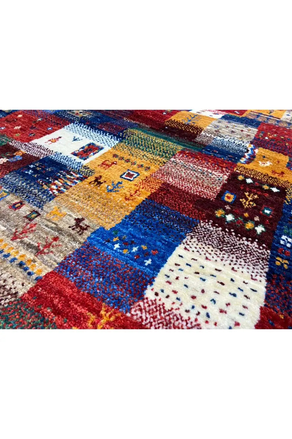 Gabbeh rug 130x86 cm close-up: colorful squares with woven-in symbols