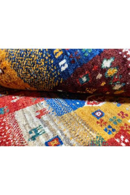 Gabbeh rug 130x86 cm pile detail: rolled edge, colorful patterns and texture