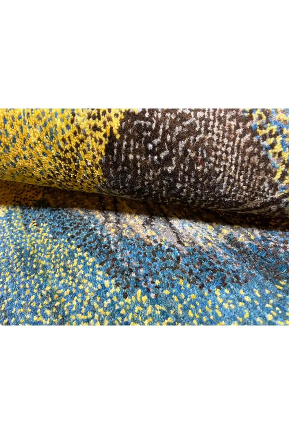 Gabbeh rug 125x79 cm close-up of the edge with blue pile and a dark motif