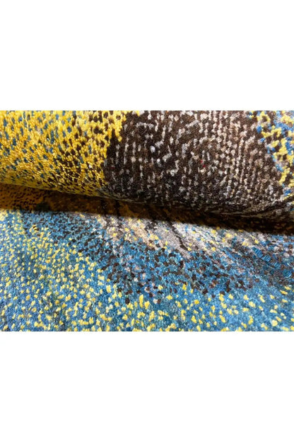 Gabbeh rug 125x79 cm close-up of the edge with blue pile and a dark motif