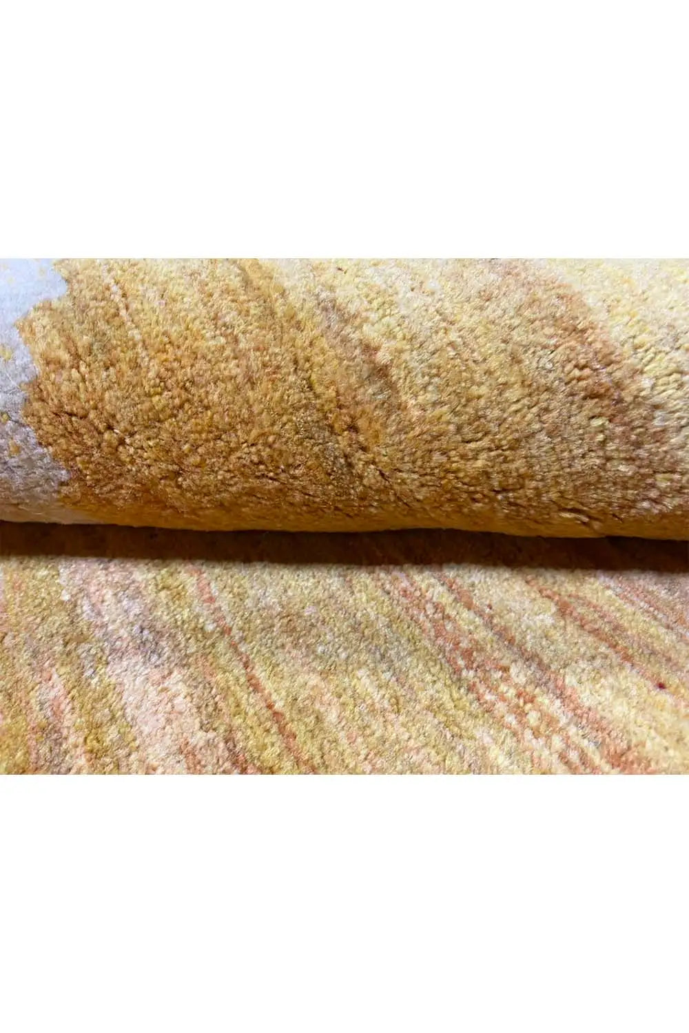 Gabbeh rug close-up of the pile structure, beige with colorful pattern elements