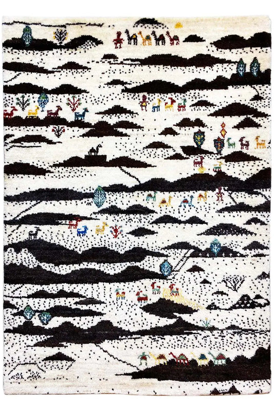 Gabbeh rug laid flat, striped pattern in cream and black with figure details