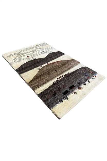Gabbeh rug (132x84 cm) viewed from the side: beige border, dark color stripes and patterns