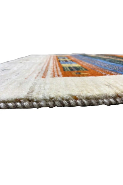 Rug edge with fringes and a densely woven surface, multicolored