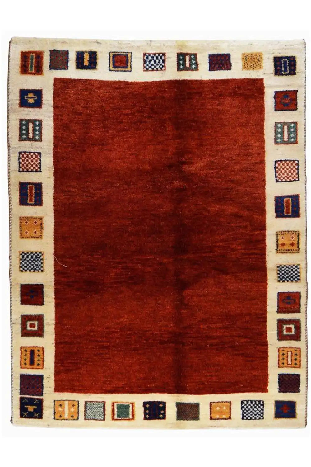Rug with a red center and beige border with dark blue and orange squares