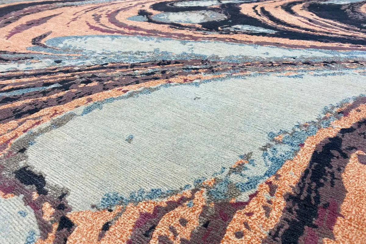 Designer rug Bo Hamsa, close-up with textured pile and abstract swirl pattern