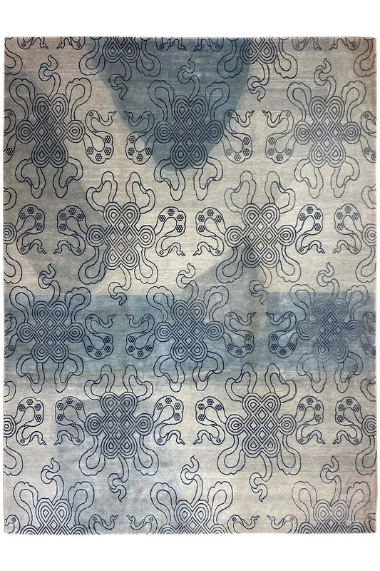 Designer rug with a blue and light gray Bo-Hamsa pattern, rectangular