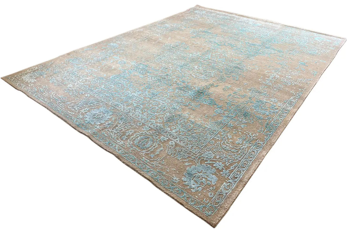 Carpet at an angle: beige background with turquoise ornamental borders