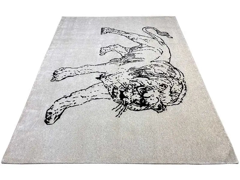 Designer rug in a rectangular format with a lying dog figure motif, light gray/black