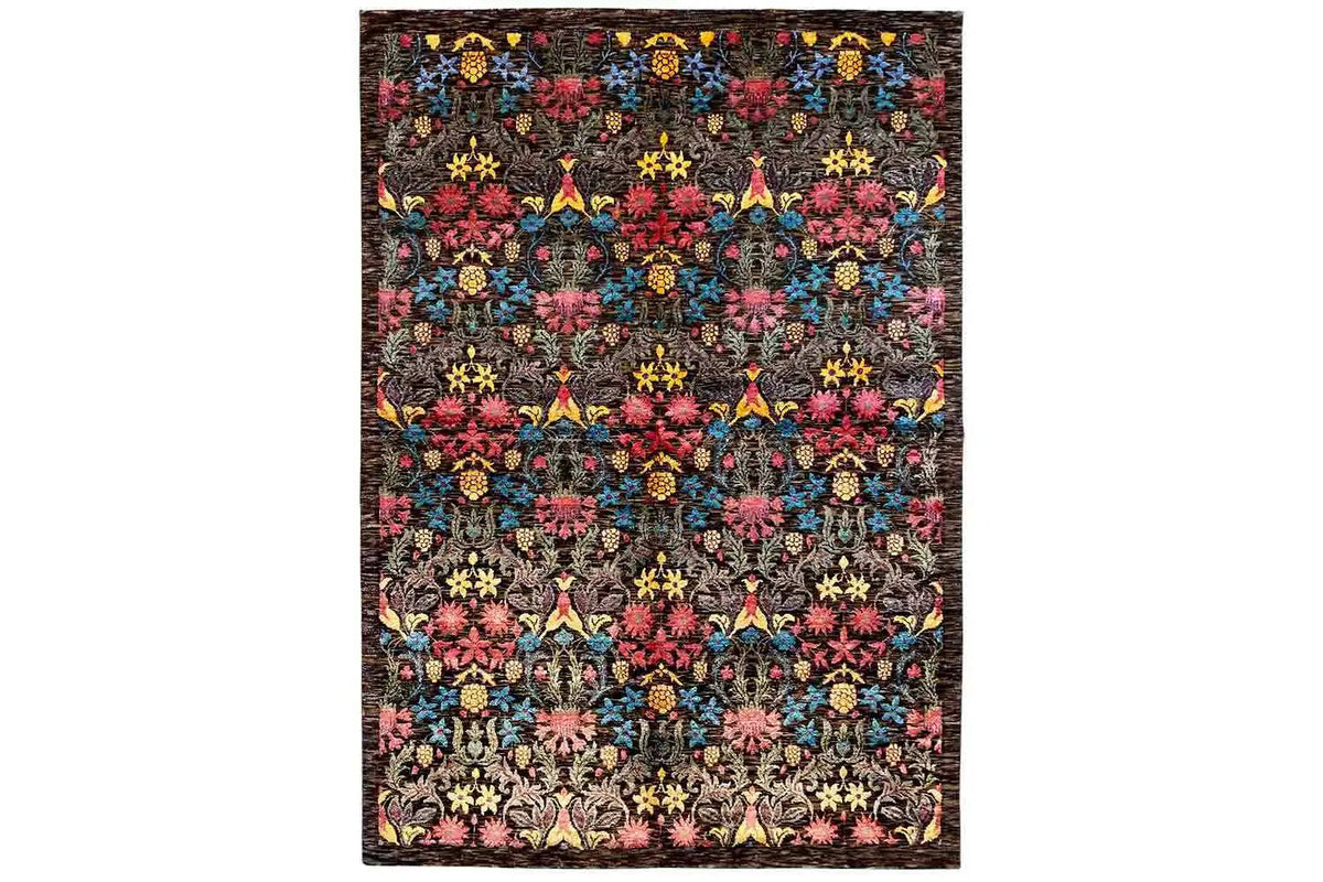 Rectangular rug with a dense multicolored ornamental pattern on a dark background