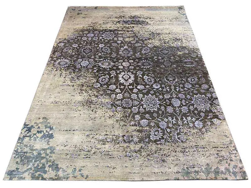 Rug with a beige vintage look and a dark floral ornamental pattern across the surface
