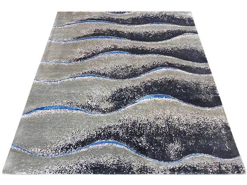 Beach rug 154x183 cm, front view: gray wave pattern with blue lines.