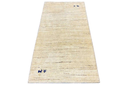 Beige Gabbeh rug with fine stripes and small blue motifs