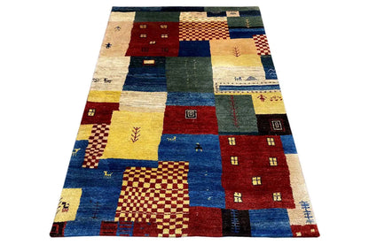 Patchwork gabbeh rug with multicolored geometric blocks