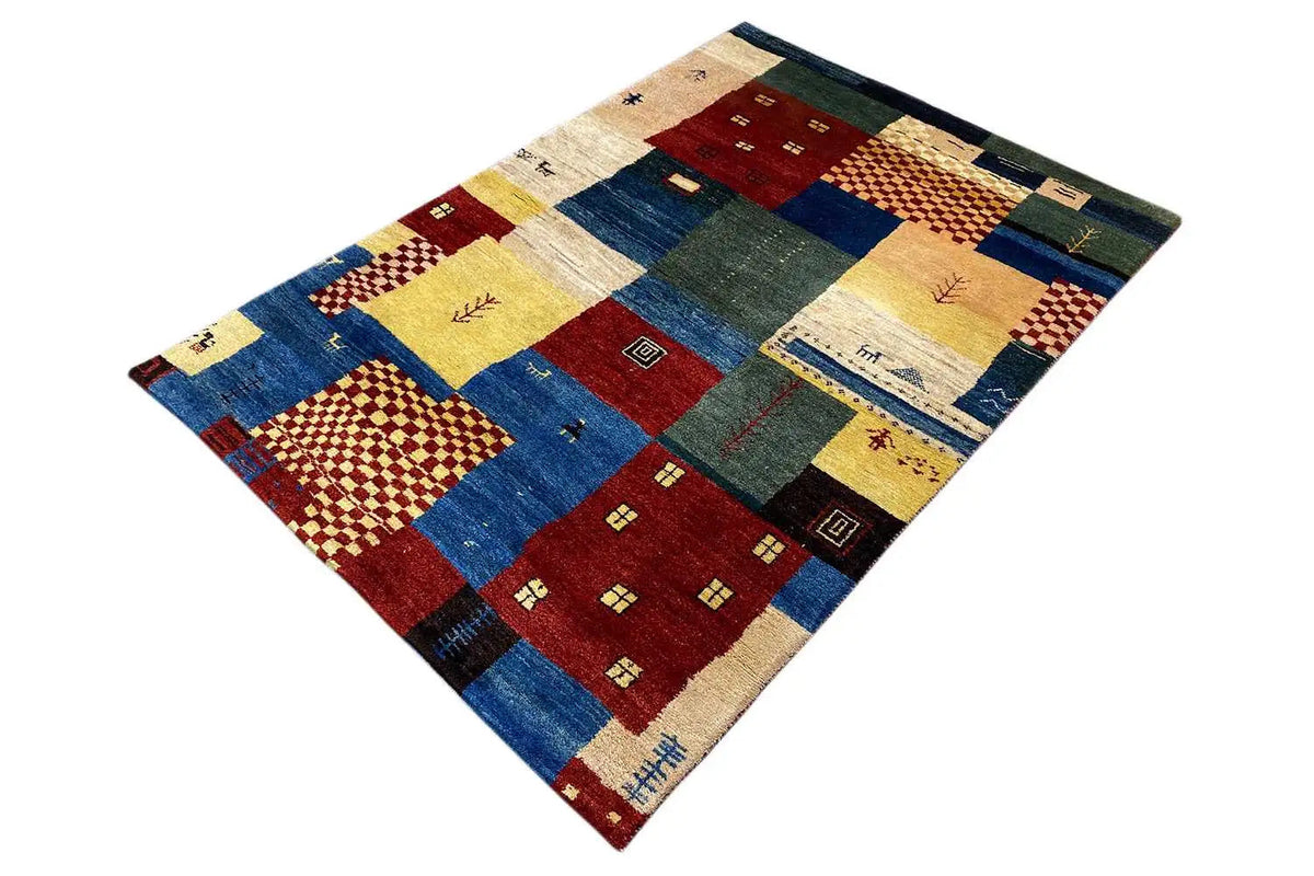 Patchwork rug with colorful rectangles and patterns