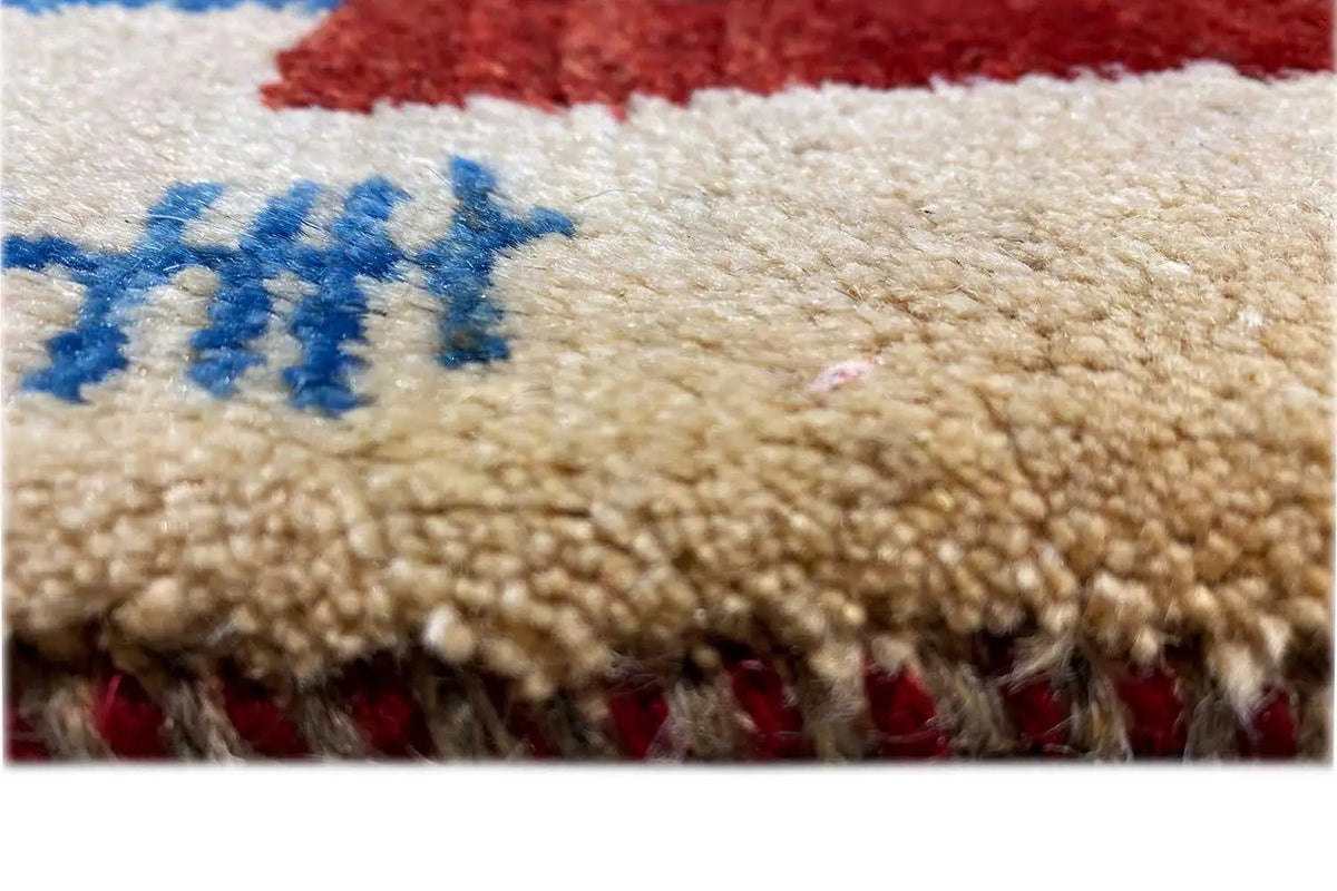 Carpet pile detail: light loops and red fringes