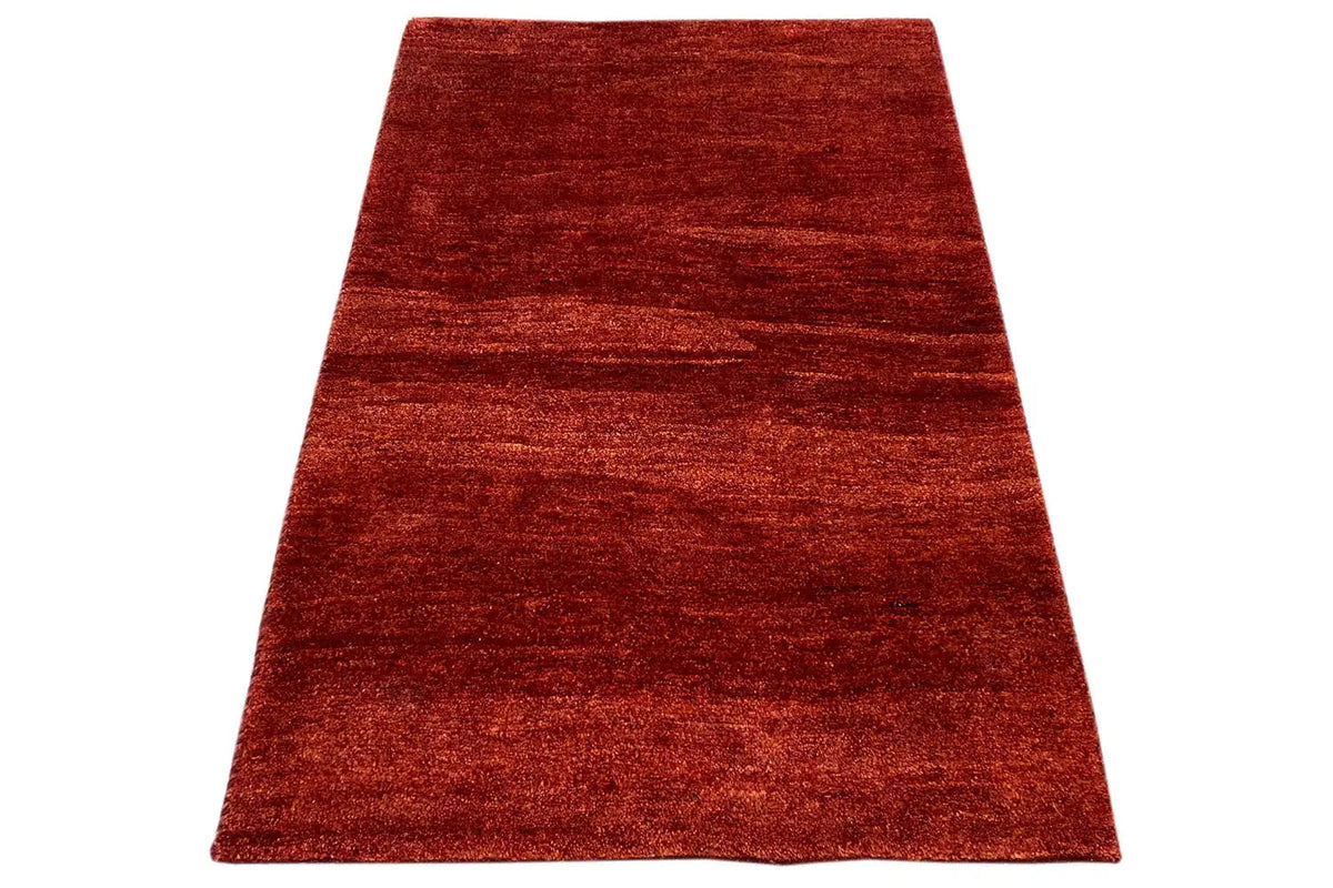 Gabbeh rug 118x82 cm, red pile, three-quarter view, rectangular shape