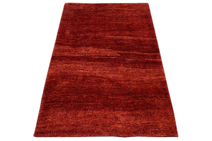 Gabbeh rug 118x82 cm, red pile, three-quarter view, rectangular shape