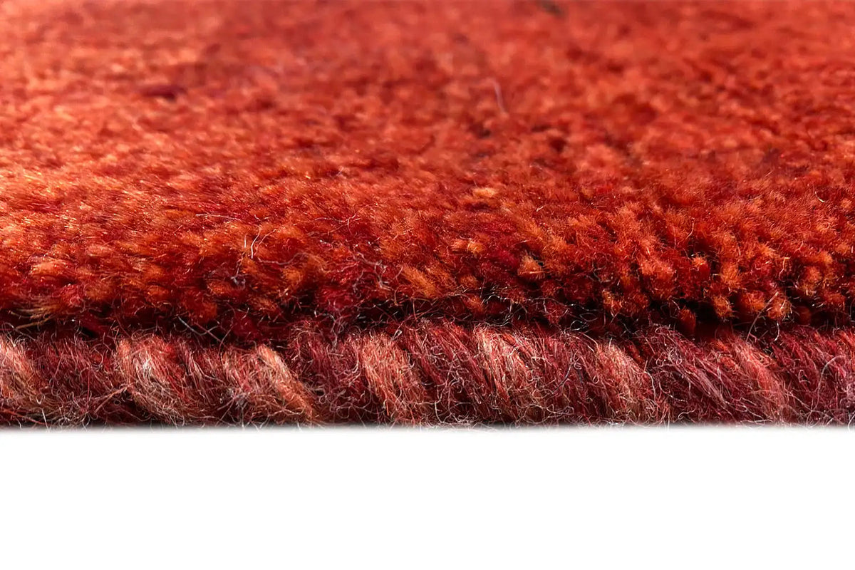 Gabbeh rug 118x82 cm, detail of the pile height at the edge, red with a fine texture