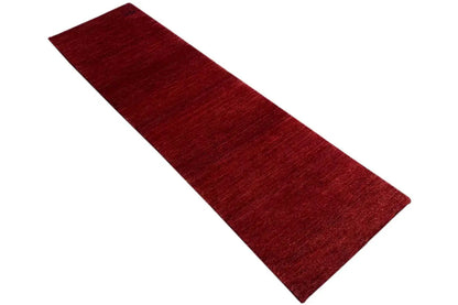 Gabbeh runner rug, mottled red pile, rectangular, flat-woven