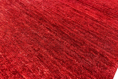 Red carpet pile in detail, mottled and uniform texture
